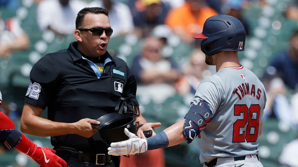 Lane Thomas reacts to umpire call