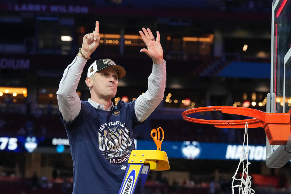 GLENDALE, ARIZONA - APRIL 08:  Head coach Dan Hurley of the Connecticut Huskies celebrates Connecticut Huskies winning their six championship after the National College Basketball Championship game against the Purdue Boilermakers at State Farm Stadium on April 08, 2024 in Glendale, Arizona.  (Photo by Mitchell Layton/Getty Images)