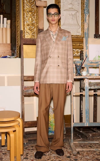 Blousy suiting, discreet patterns and pastel colours are a feature of Sir Paul's new collection