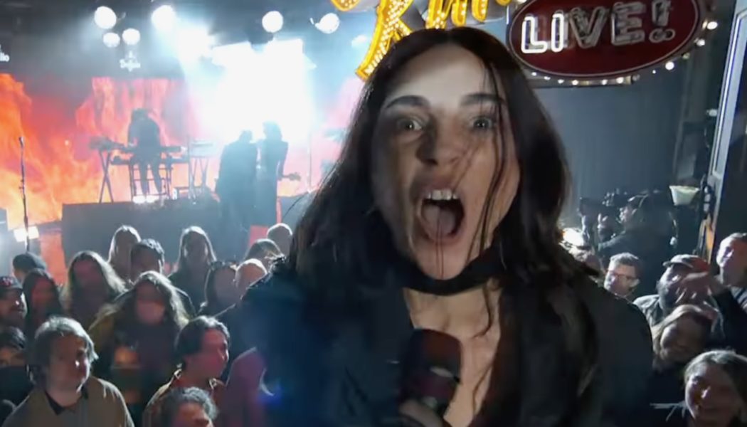 St. Vincent moshes in the pit for “Broken Man” performance on Kimmel