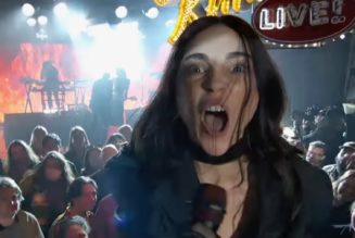 St. Vincent moshes in the pit for “Broken Man” performance on Kimmel