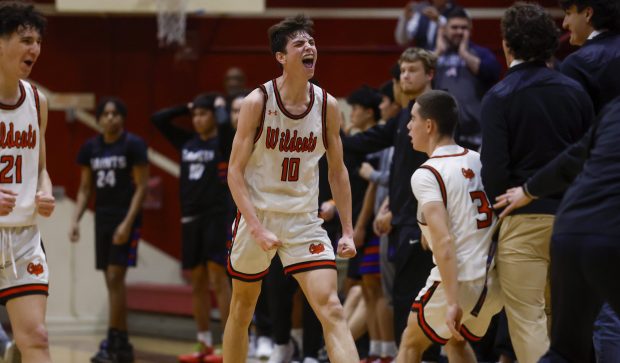 Los Gatos' Scotty Brennan (10) celebrates a play against Santa Teresa High School late in overtime of their Central Coast Section Division I boys basketball semifinal game at Fremont High School in Santa Clara, Calif., on Thursday, Feb. 22, 2024. (Nhat V. Meyer/Bay Area News Group)