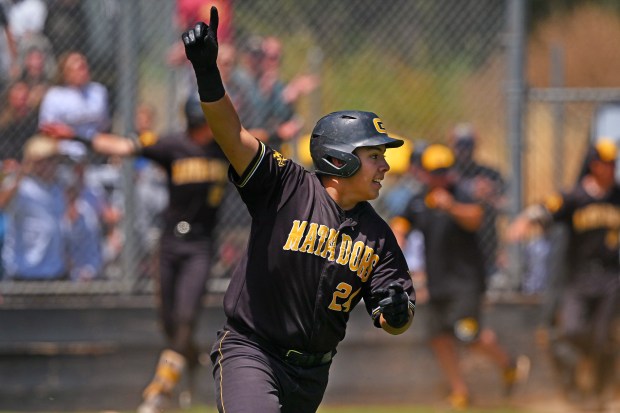 Granada's A.J. Martinez (24) celebrates after hitting the game winning walk-off single against De La Salle in the 14th inning of their NCS Div. 1 Championship game at Granada High School in Livermore, Calif., on Saturday, May 25, 2024. The game was started yesterday in Danville but was suspended for darkness at the end of 10th inning with the score tied 0-0. Granada defeated De La Salle 1-0 with a walk-off single in the 14th inning hit by Granada's A.J. Martinez (24). (Jose Carlos Fajardo/Bay Area News Group)