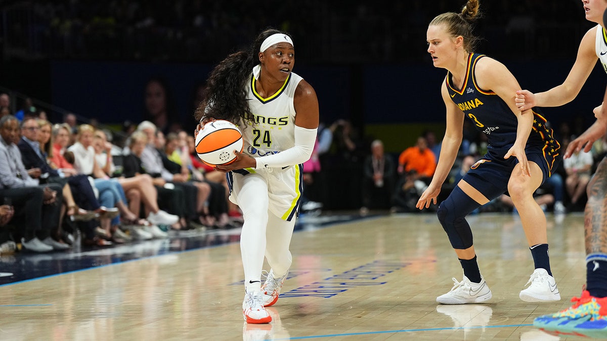 Arike Ogunbowale on the basketball court