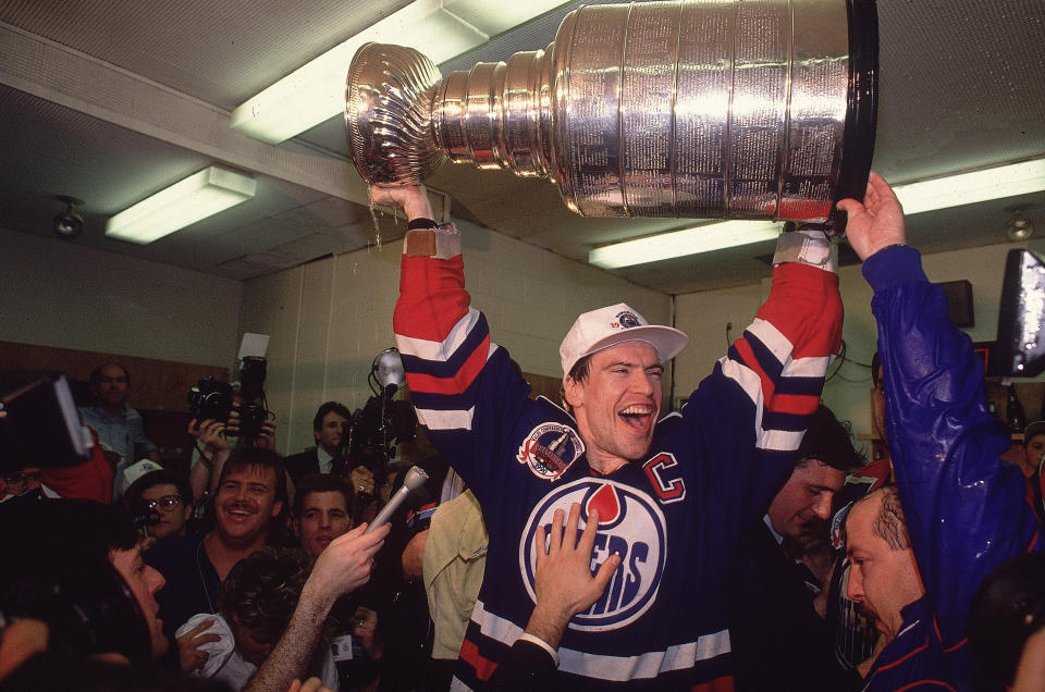 Mark Messier hoists the Cup after Edmonton's fifth title in 1990. (David E. Klutho/Sports Illustrated via Getty Images)