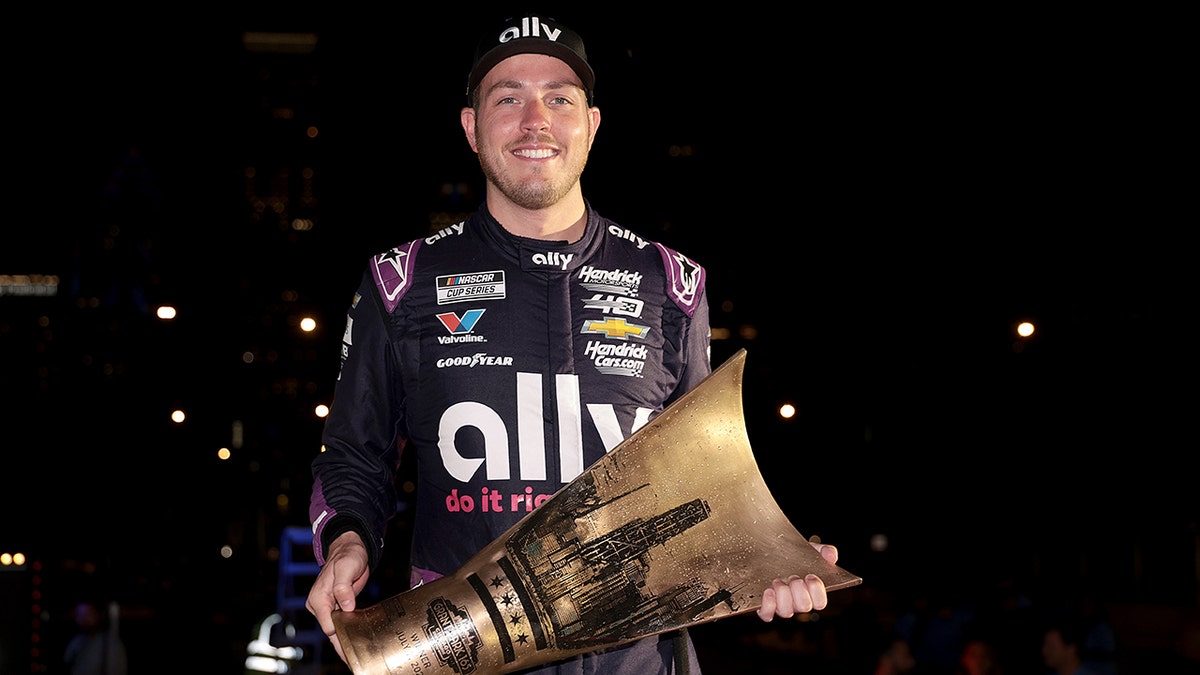 Alex Bowman celebrates