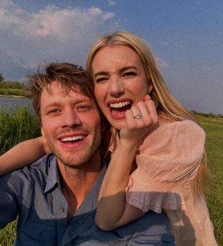 Emma Roberts poses with her engagement ring