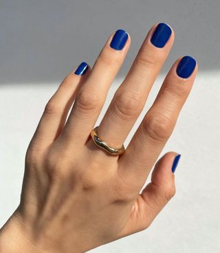 Vibrant blue nail polish