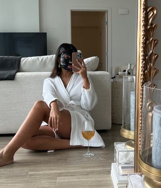 Influencer does wellness self-care routine.