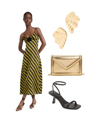 A woman wearing a striped dress, gold earrings, a gold bag, black heels.