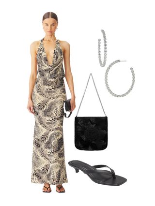 A woman wearing a maxi dress, a beaded black bag, black heels