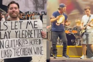 Pearl Jam fan travels 7,000 miles, bribes Eddie Vedder with wine to play "Yellow Ledbetter" with band on stage