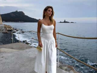 Cass Dimicco in a white dress.