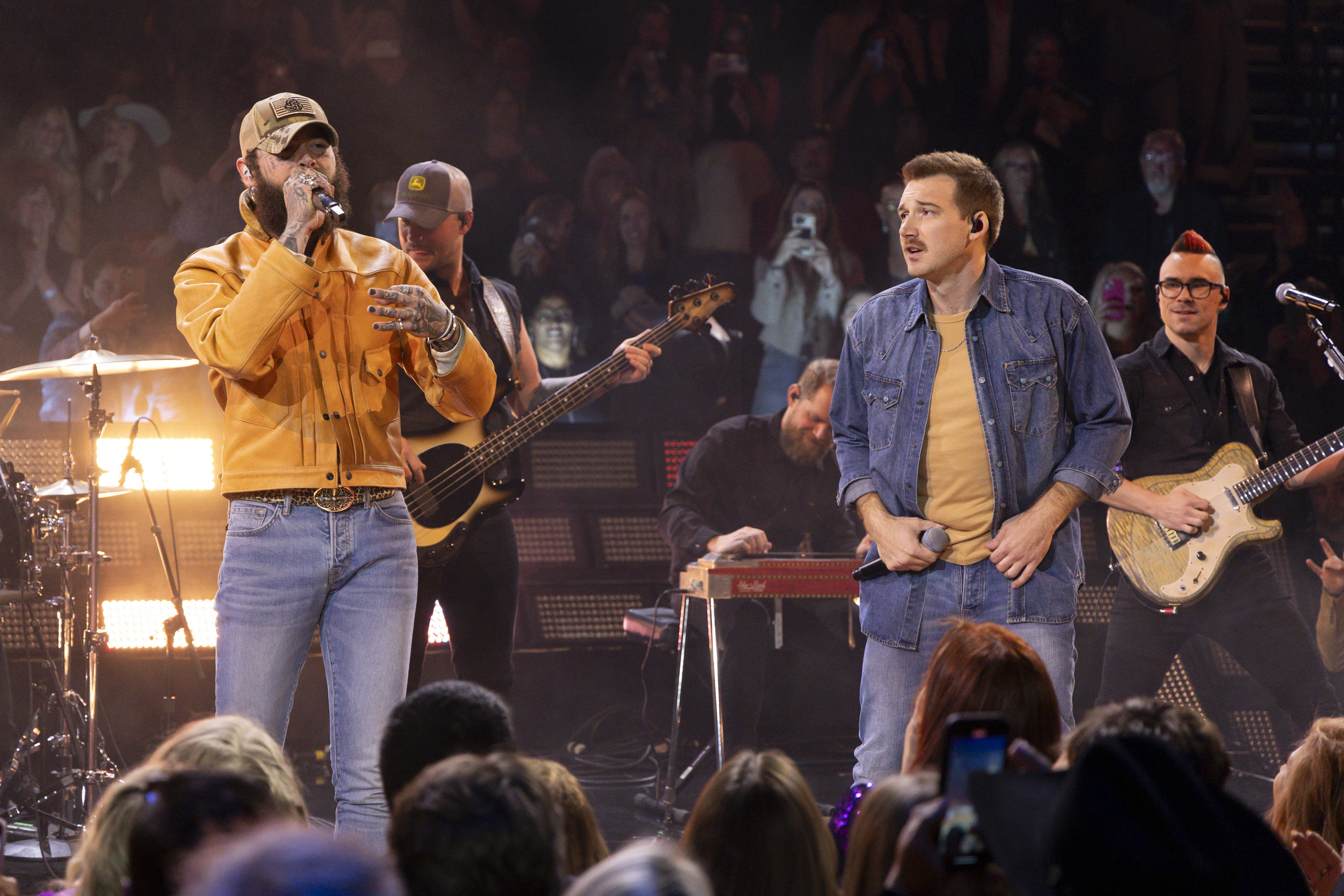 Singers Post Malone and Morgan Wallen performing at the 57th Annual CMA Awards on November 8, 2023.