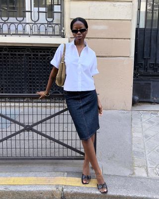 Woman wearing a denim pencil skirt