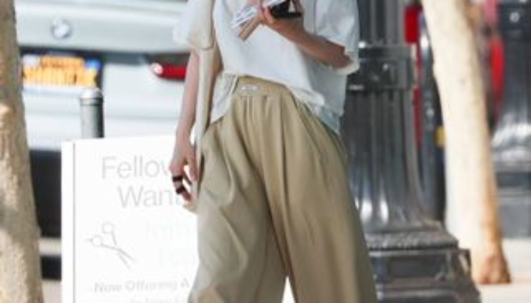 Emily Cooper Would Never (Ever!) Wear Lily Collins' Latest Low-Key Trouser-and-Trainer Combo