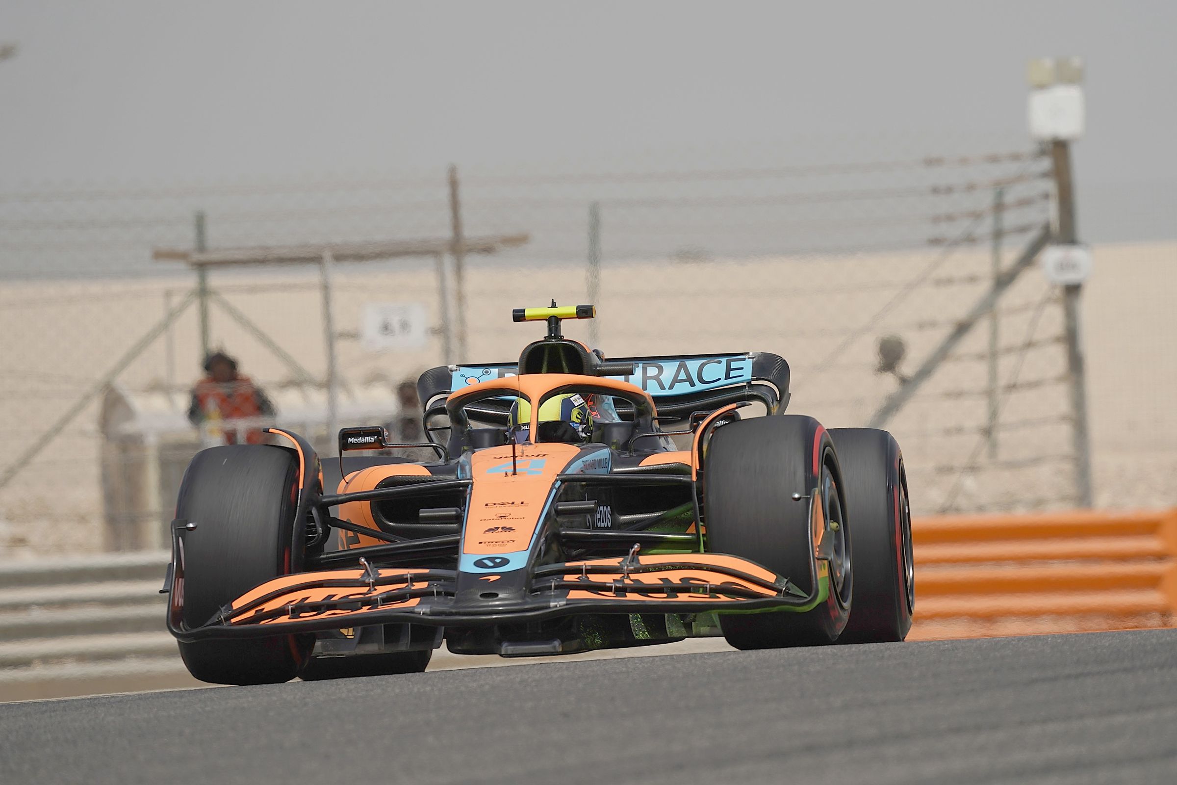 Picture of a Formula 1 car driving on a track.