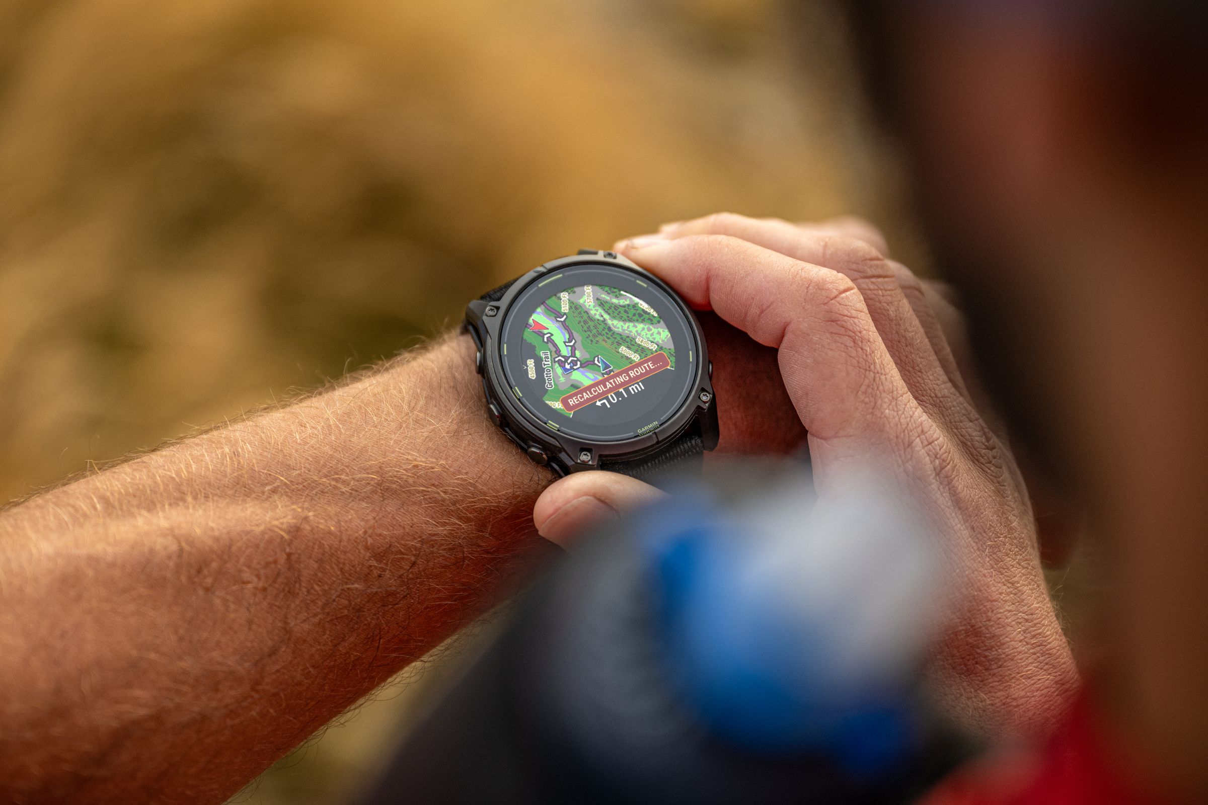 Person looking at the Enduro 3 on their wrist