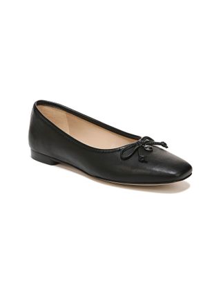 black ballet flats with a small black bow