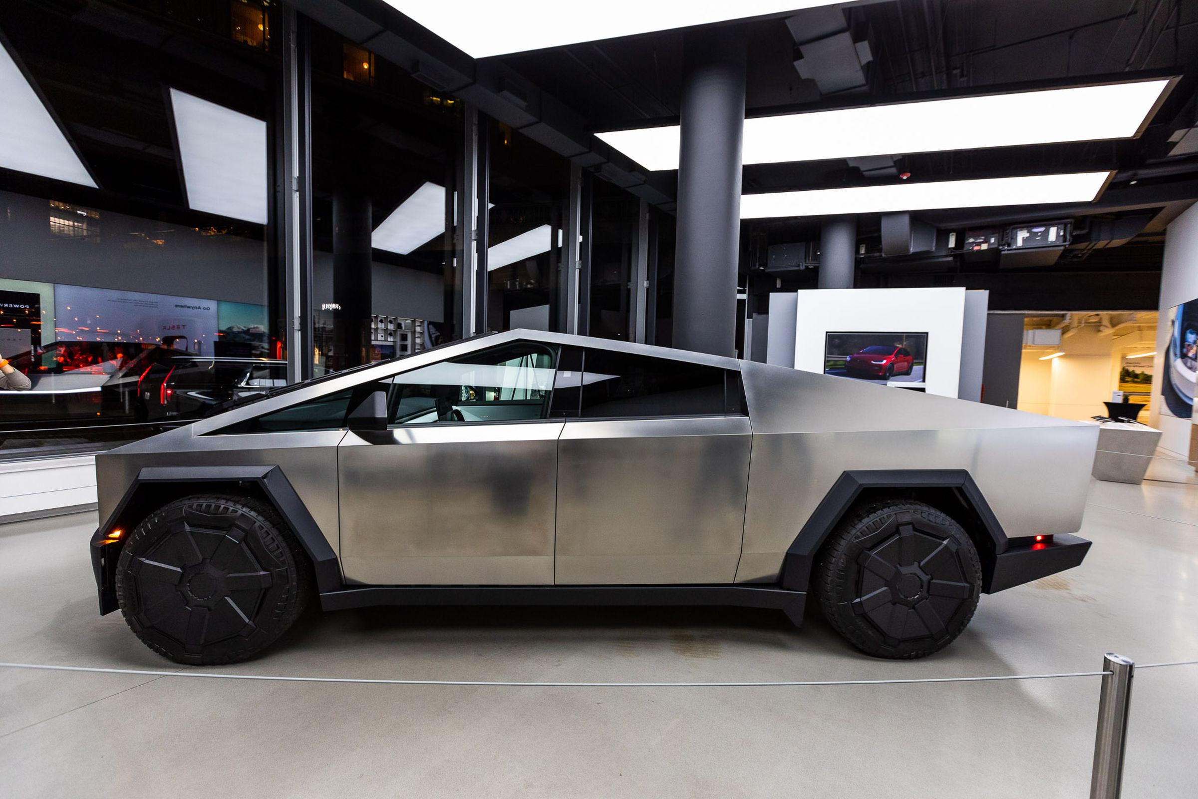 A photo of the Tesla Cybertruck in a Tesla showroom.