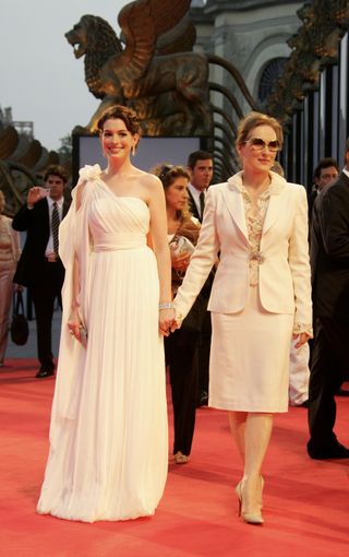 Anne Hathaway and Meryl Streep pose on the red carpet in Venice