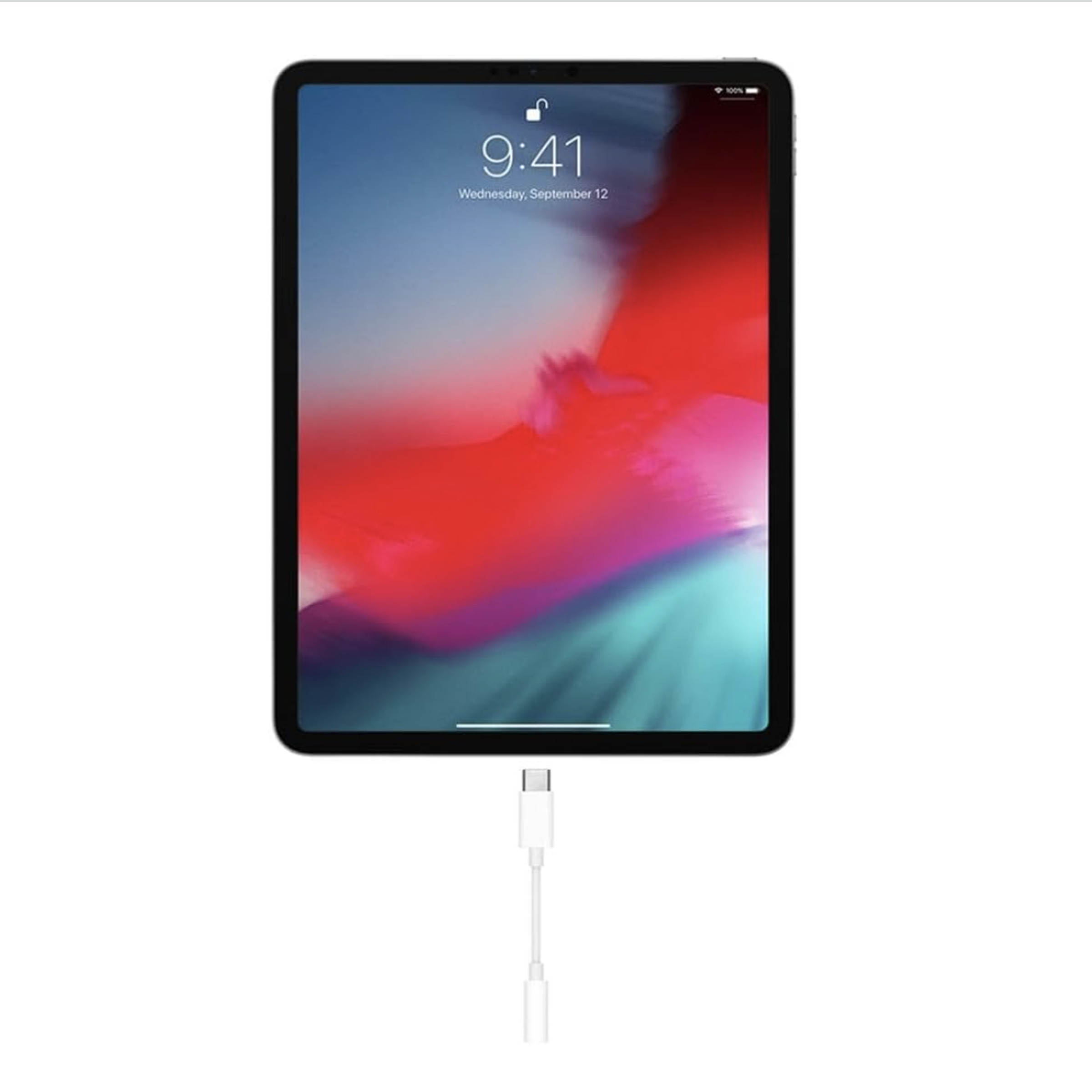 iPad with headphone jack adapter attached