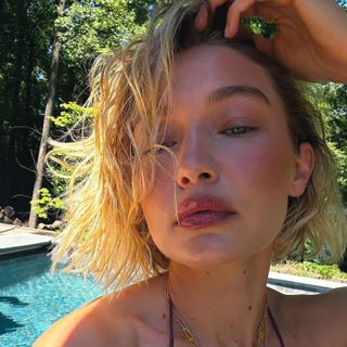 Gigi Hadid with sunflower blonde hair.