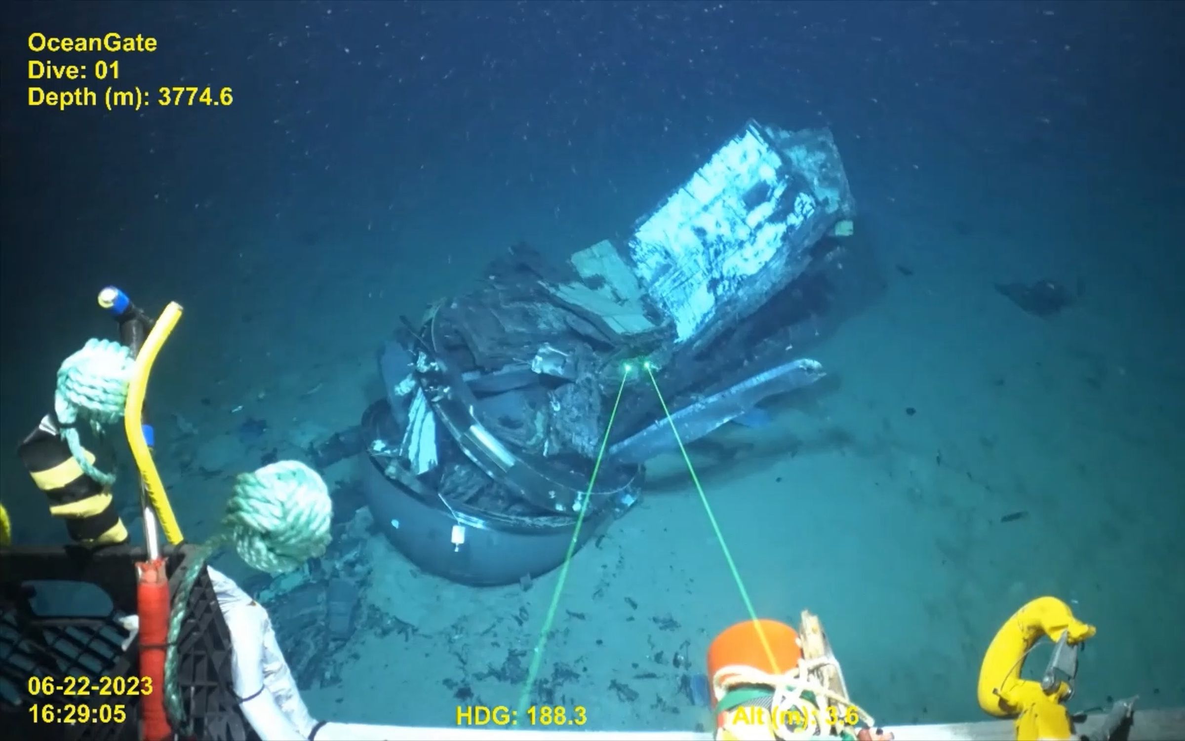 An underwater photo of the wreckage of the OceanGate Titan submarine resting on the ocean floor.