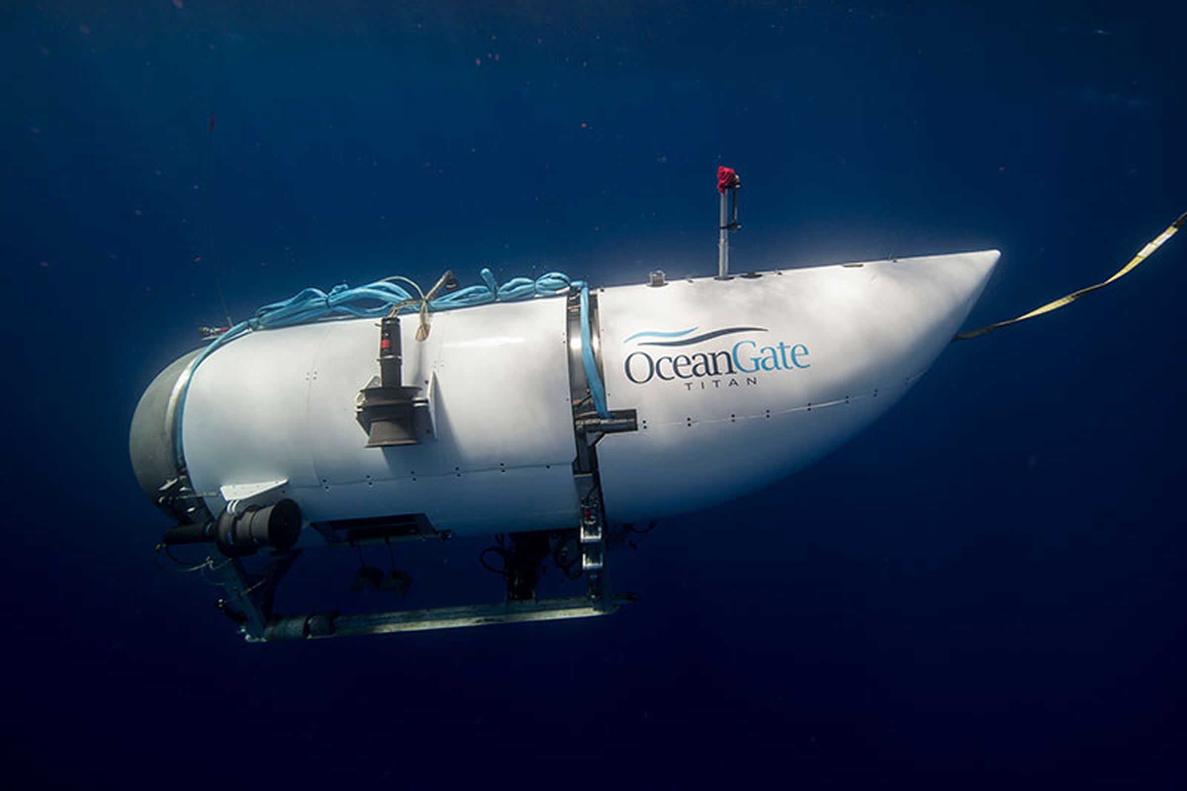 An image of the OceanGate Titan from the side as it sits underwater.