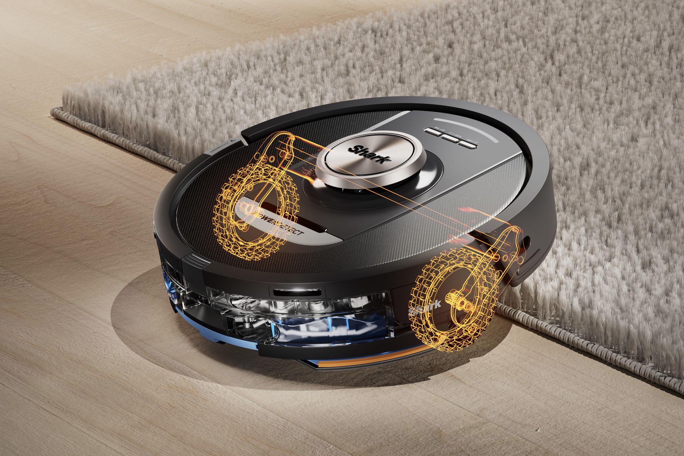 robot vacuum at a beige rug with an r-ray view of the mechanics that help it lift up.