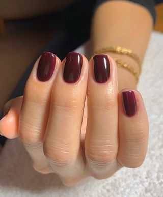 Short dark red nails