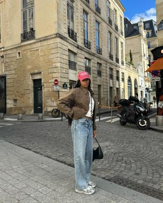 Woman wearing chunky sneakers in Paris