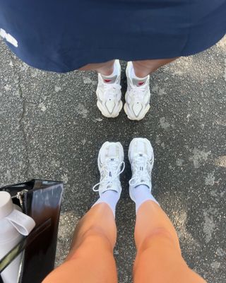 Woman wearing chunky sneakers in Paris