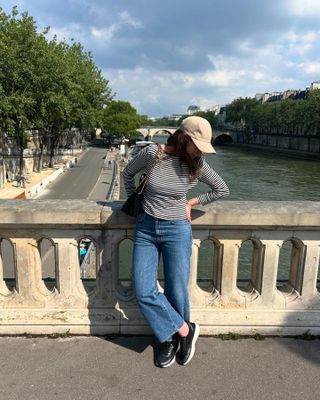 Woman wearing chunky sneakers in Paris