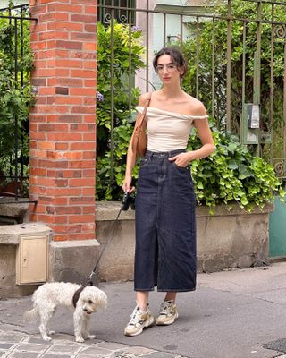 Woman wearing chunky sneakers in Paris