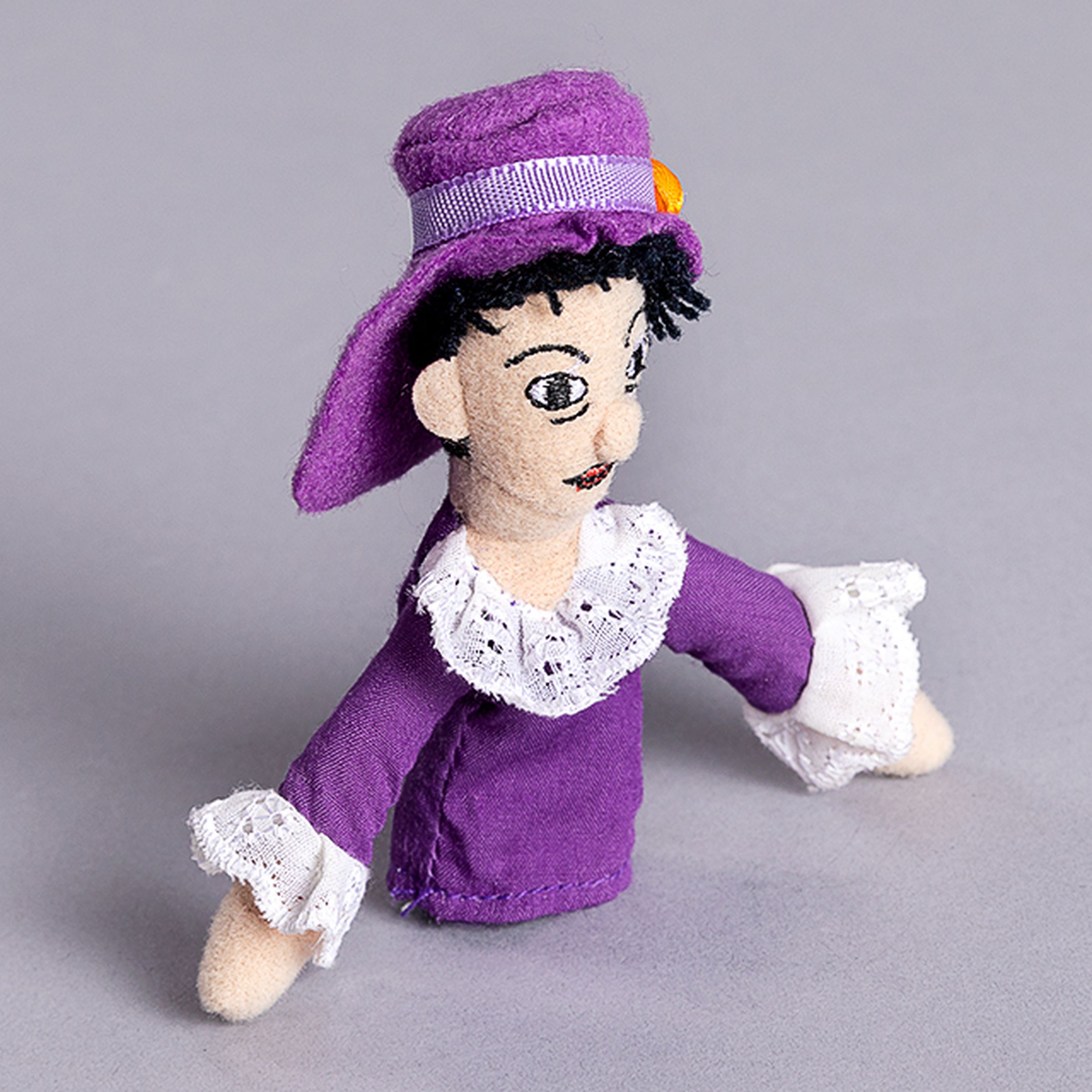 Finger puppet fashioned to look like Dorothy Parker.