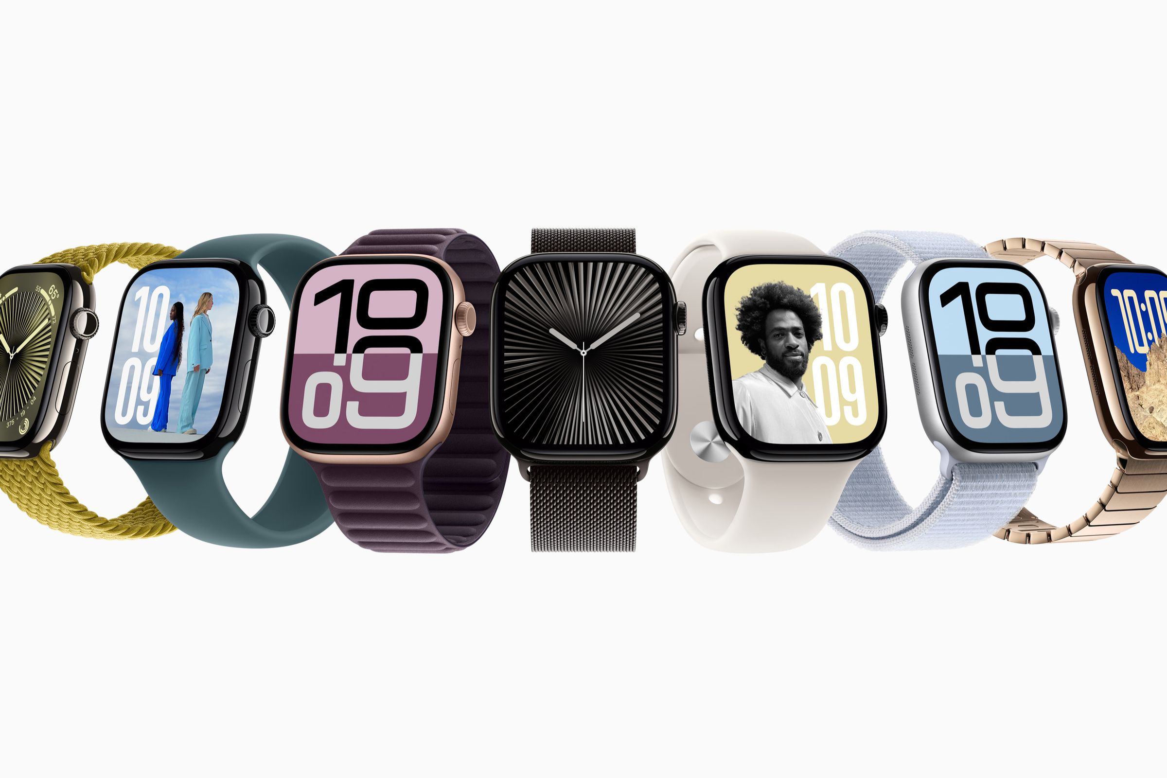 Multiple Apple smartwatches in different colors.