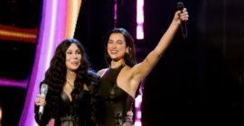 Cher accepts Rock Hall induction, performs “Believe” with Dua Lipa