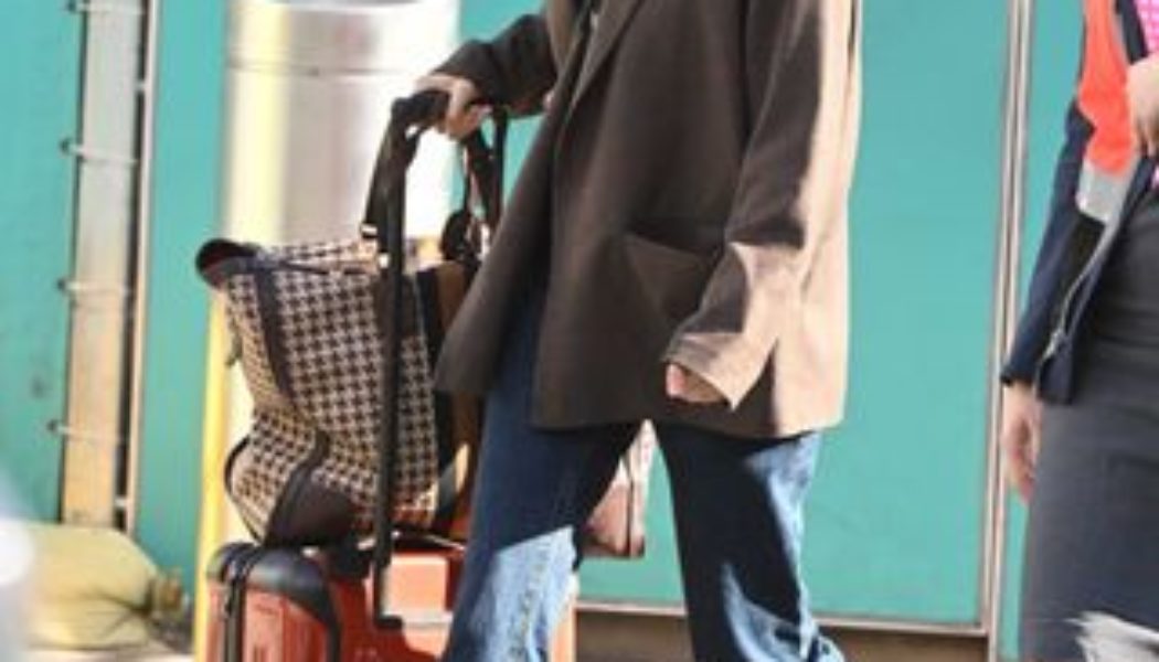 Elizabeth Olsen Just Wore the Only Boot Style That’s Actually Sensible For the Airport