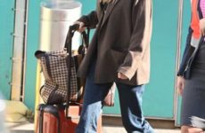 Elizabeth Olsen Just Wore the Only Boot Style That’s Actually Sensible For the Airport