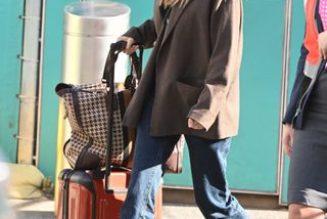 Elizabeth Olsen Just Wore the Only Boot Style That’s Actually Sensible For the Airport