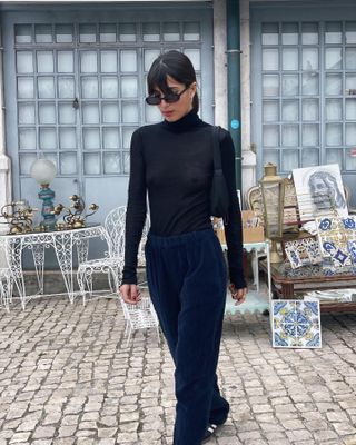 Influencer wears cordoury trousers