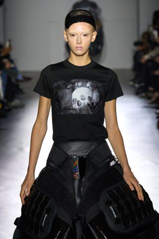 black graphic tee at junya watanabe at paris fashion week spring summer 2025