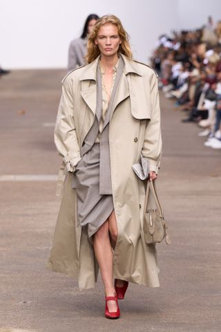 stella mccartney trench coat and grey skirt suit at paris fashion week spring summer 2025