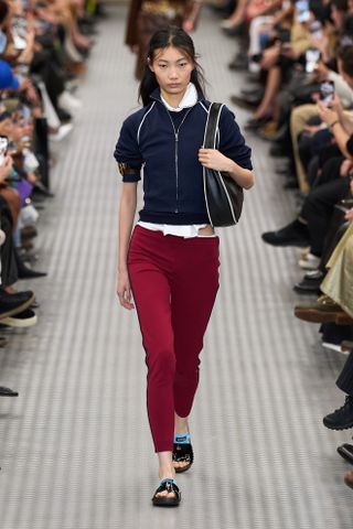 red leggings and blue sporty jacket at Miu Miu for paris fashion week spring summer 2025