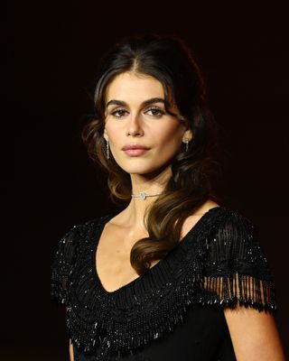 Kaia Gerber attends the 2024 Academy Awards Gala wearing a makeup look inspired by Gothic Hollywood glamor