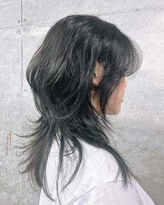 Jellyfish haircut on black hair with lots of textures and shape