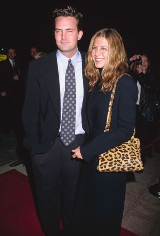 Jennifer Aniston wears a leopard bag in the '90s