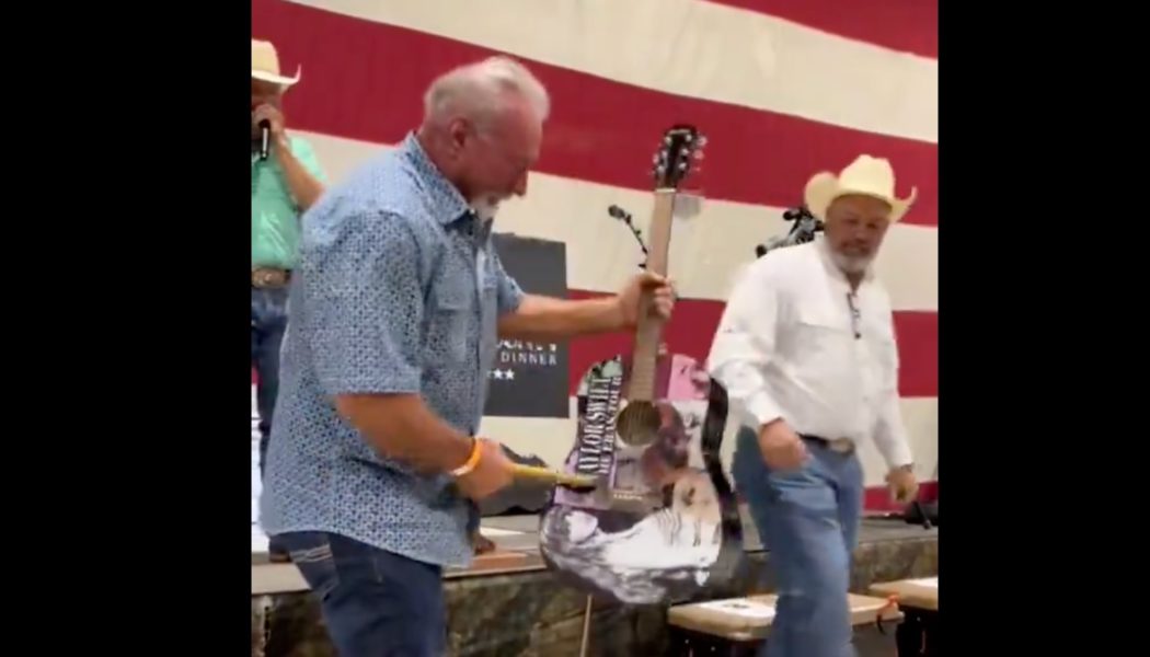 Man buys Taylor Swift-signed guitar at auction for $4000, promptly destroys it