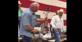 Man buys Taylor Swift-signed guitar at auction for $4000, promptly destroys it